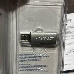 Silver SYNC USB Flash Drive Ford software map update. Purchased in October 2024.